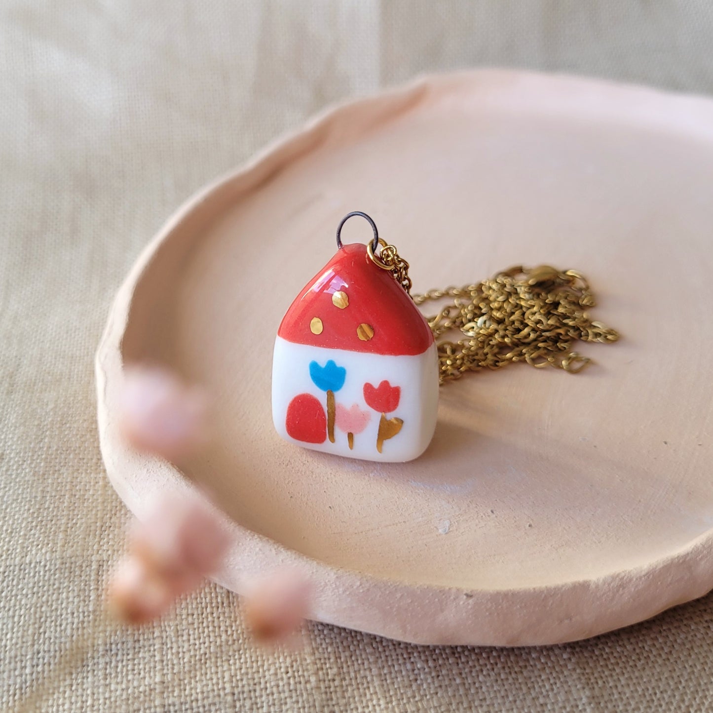 Porcelain necklace with gold "Red house with tulips"