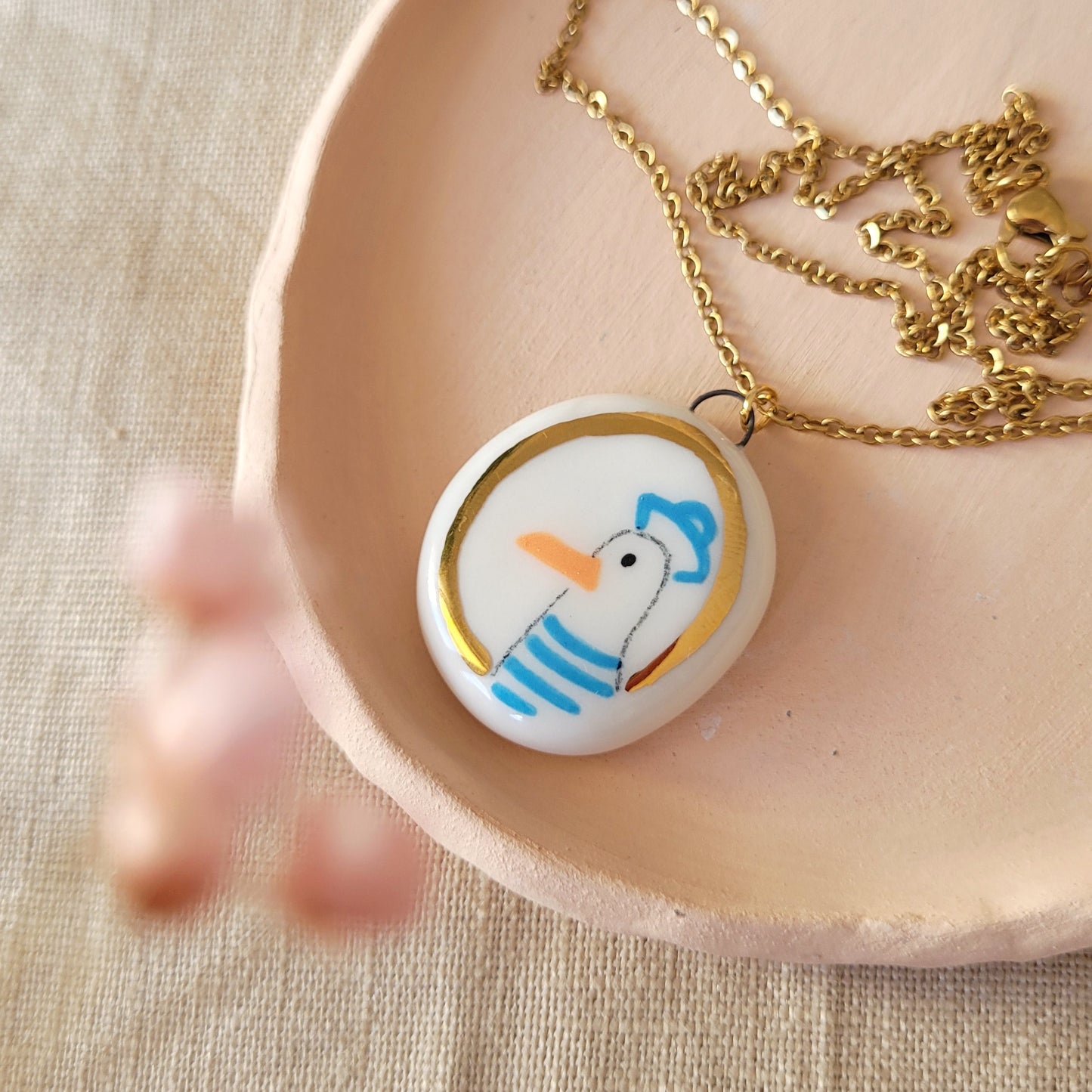 Porcelain necklace with gold "Seagull"
