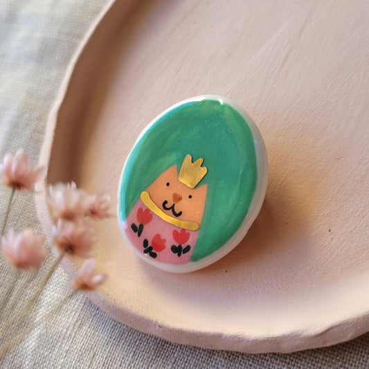 Porcelain brooch with gold "Cat with pink dress"