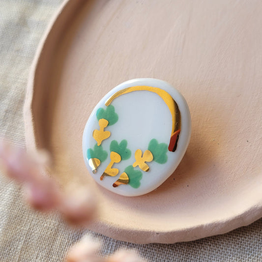 Porcelain brooch with gold "Green flowers"
