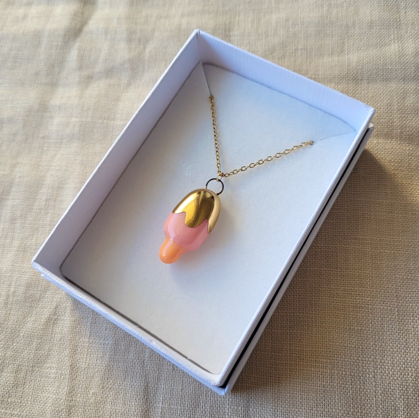 Porcelain necklace with gold "Pink ice cream"