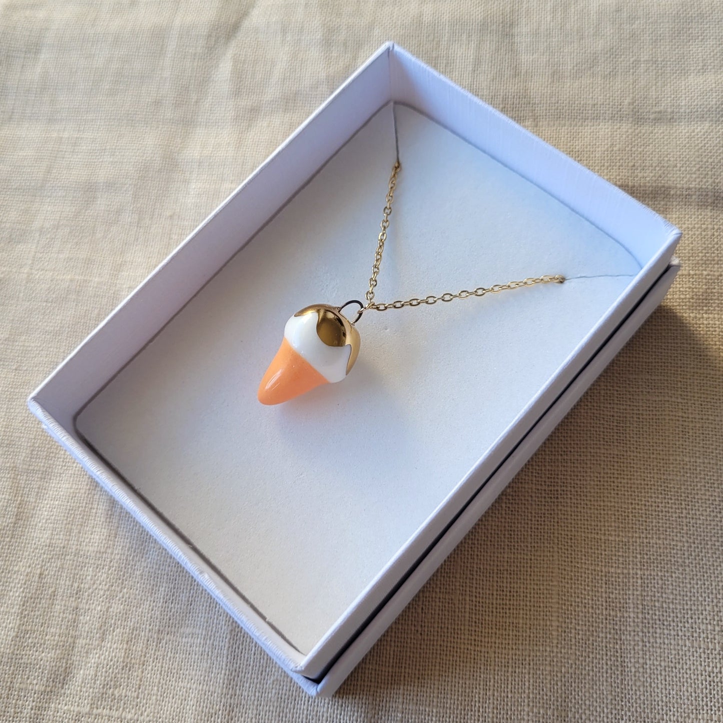 Porcelain necklace with gold "Ice cream cone"