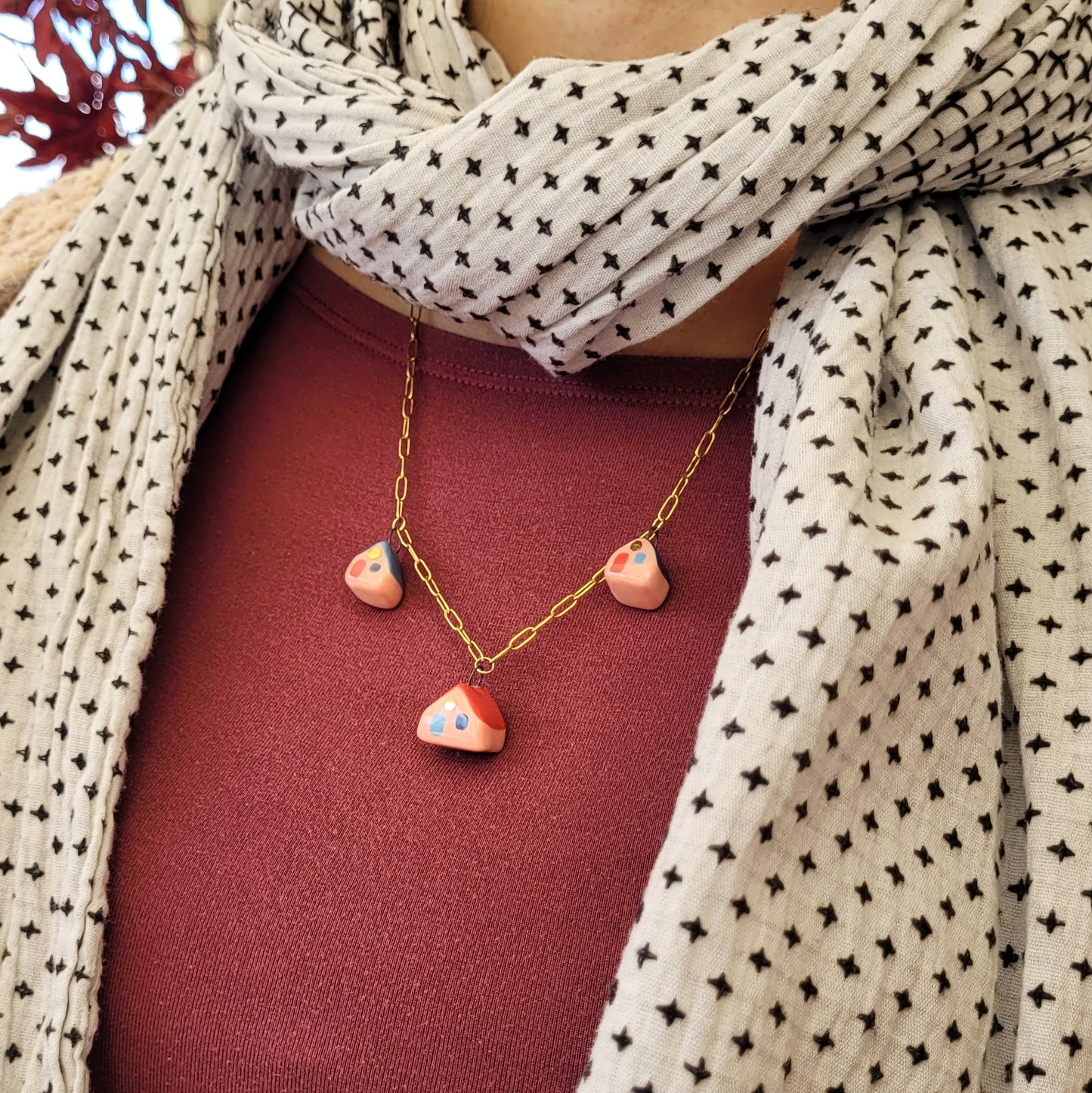 Porcelain necklace with gold "Three houses"