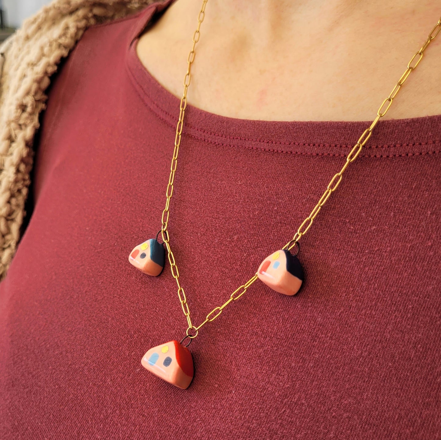 Porcelain necklace with gold "Three houses"