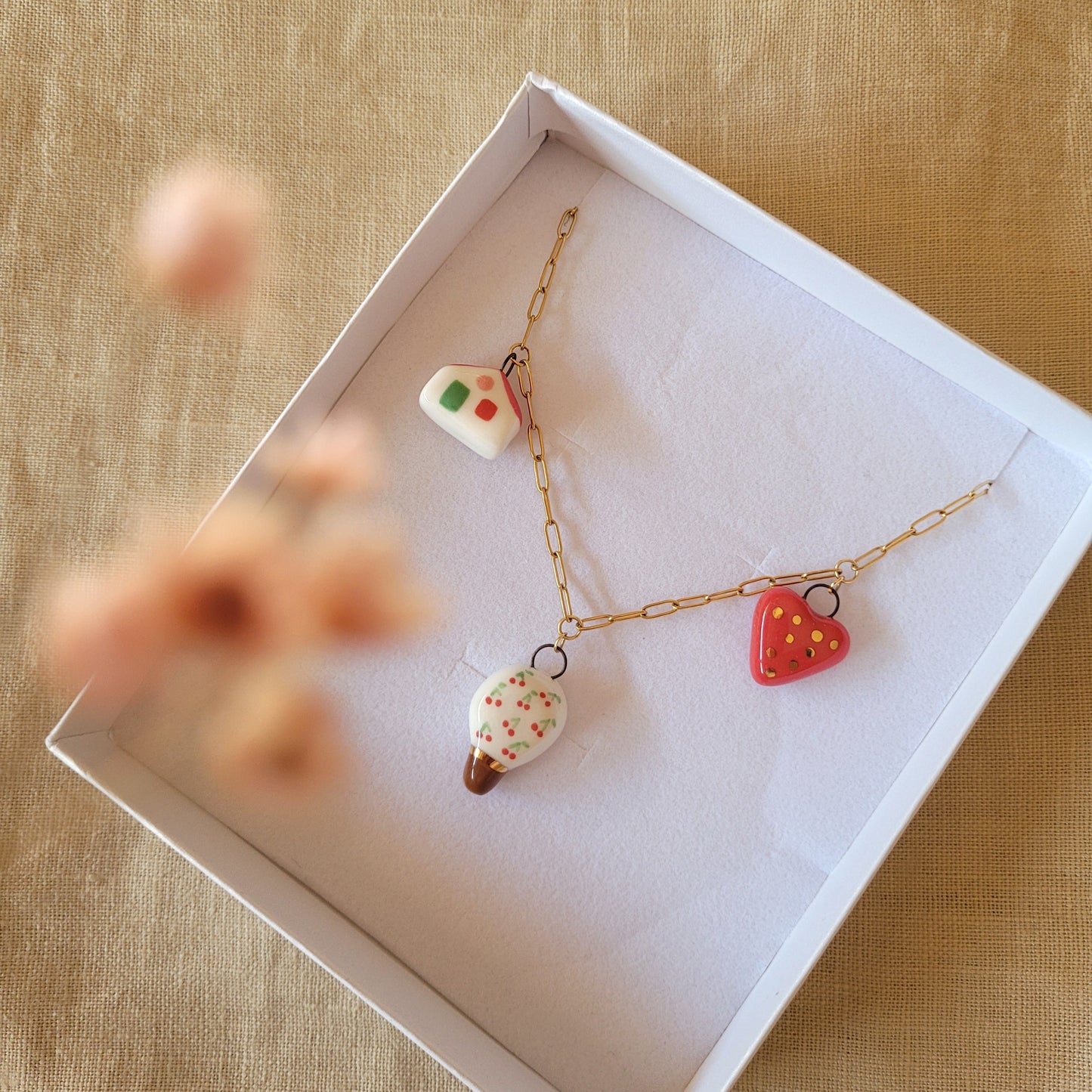 Porcelain necklace with gold "Cherry tree, house and heart"