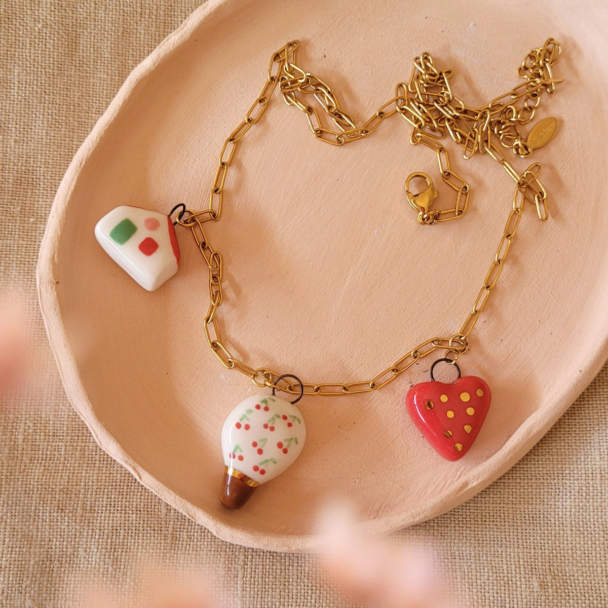 Porcelain necklace with gold "Cherry tree, house and heart"
