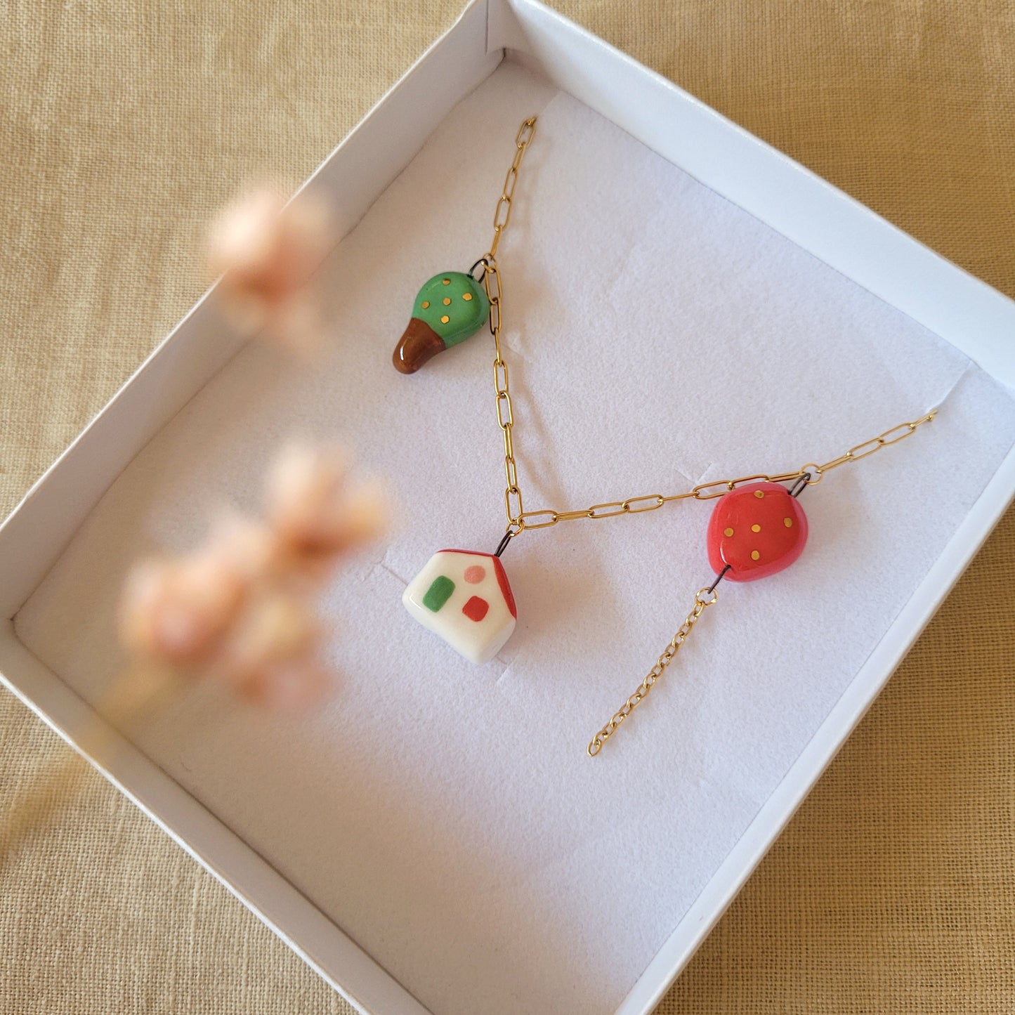 Porcelain necklace with gold "Red balloon, house and tree"