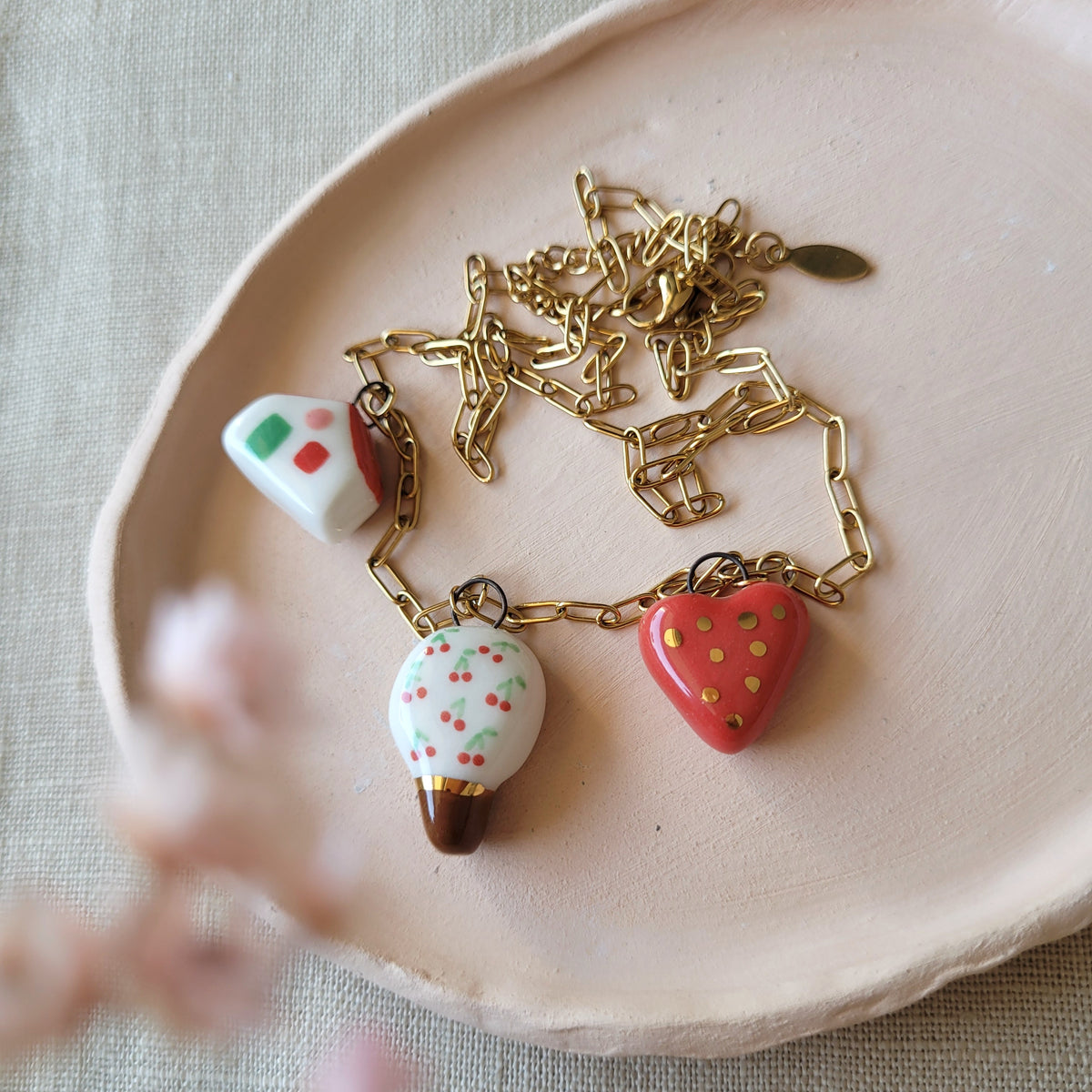 Porcelain necklace with gold "Cherry tree, house and heart"