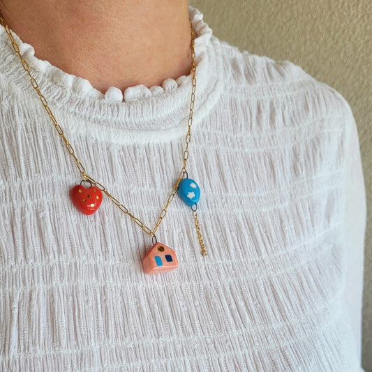 Porcelain necklace with gold "House, heart and balloon"