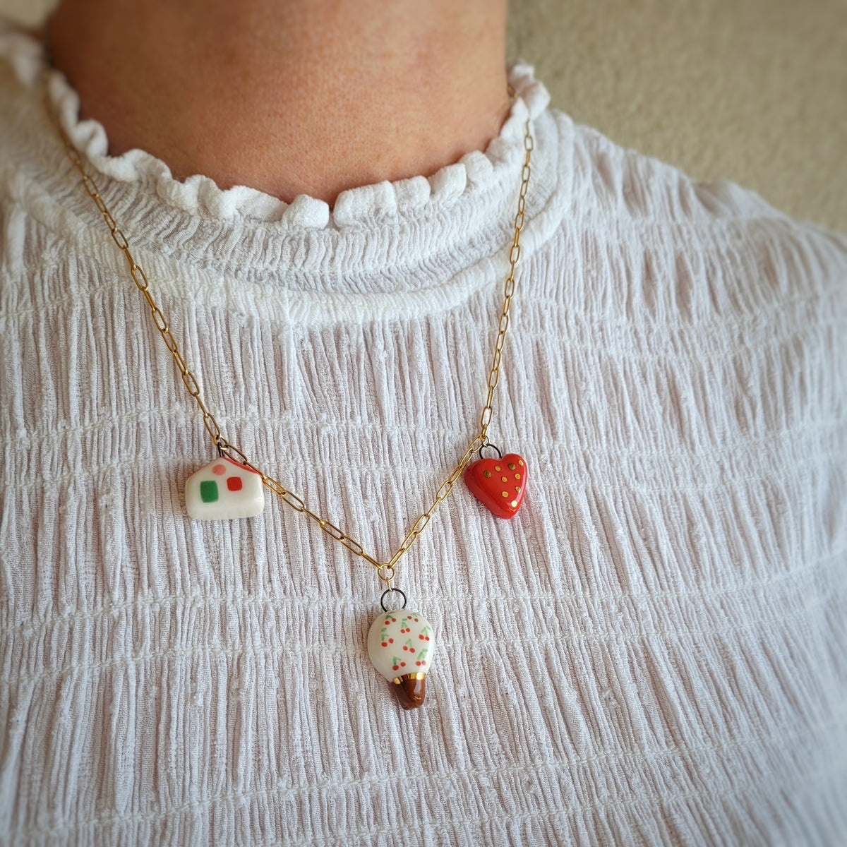 Porcelain necklace with gold "Cherry tree, house and heart"