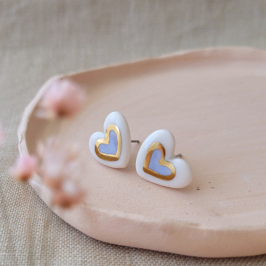Porcelain stud earrings with gold "Light purple hearts with gold"