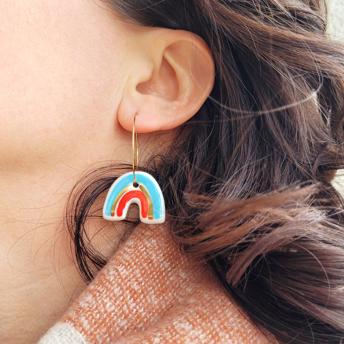 Porcelain dangle earrings with gold "Light blue cloud and rainbow with red"