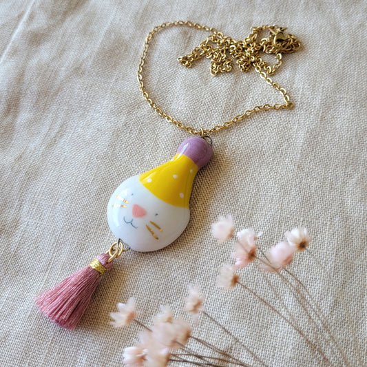 Porcelain necklace with gold "Big party kitty with yellow hat"