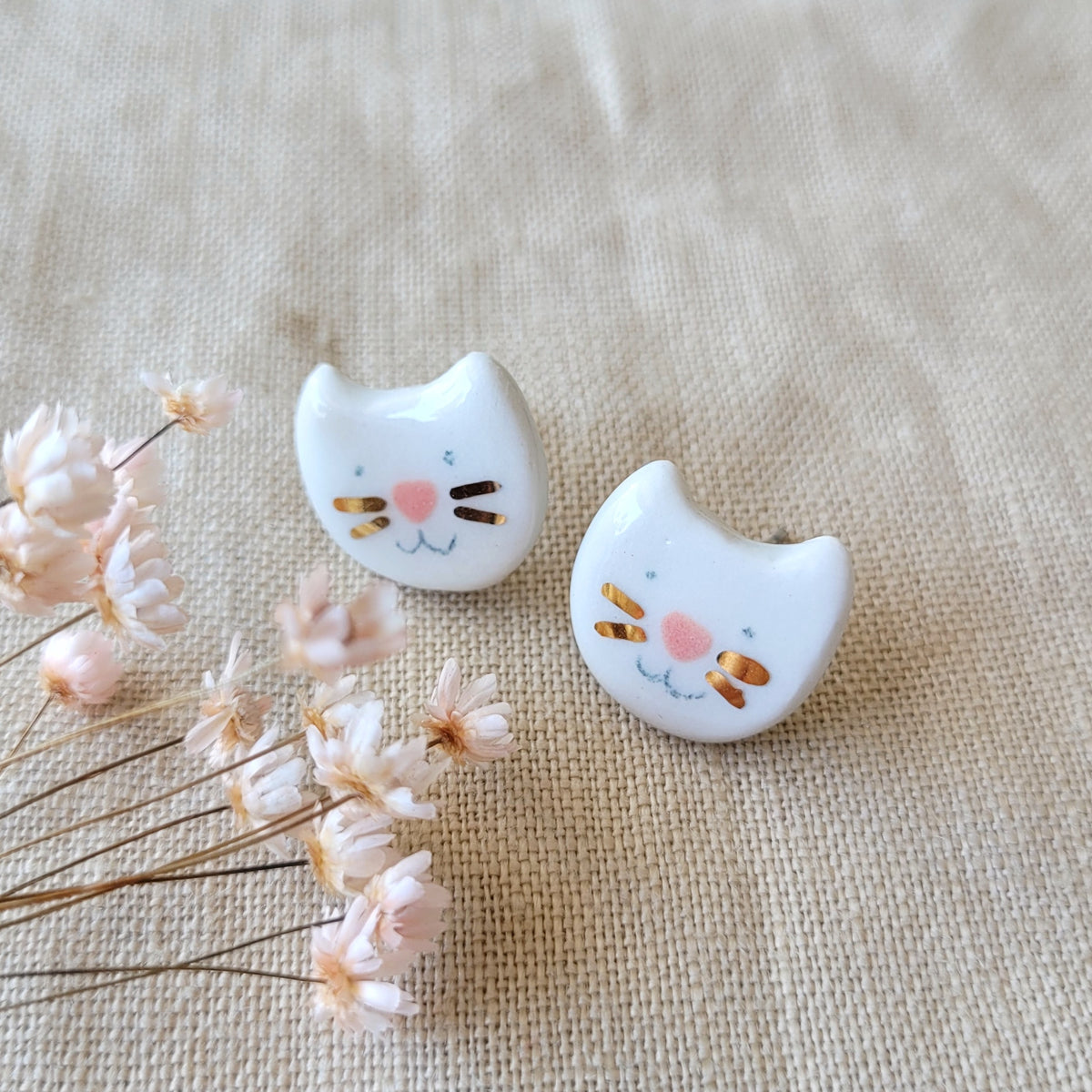 Porcelain stud earrings with gold "Tiny white kitties"
