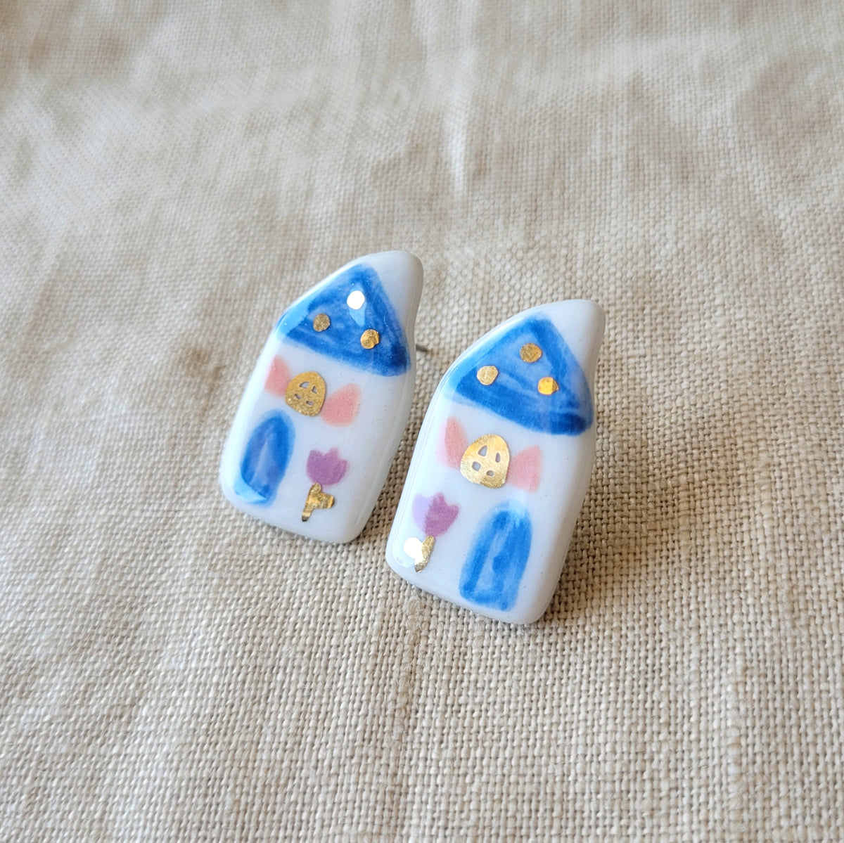Porcelain stud earrings with gold "Blue houses"