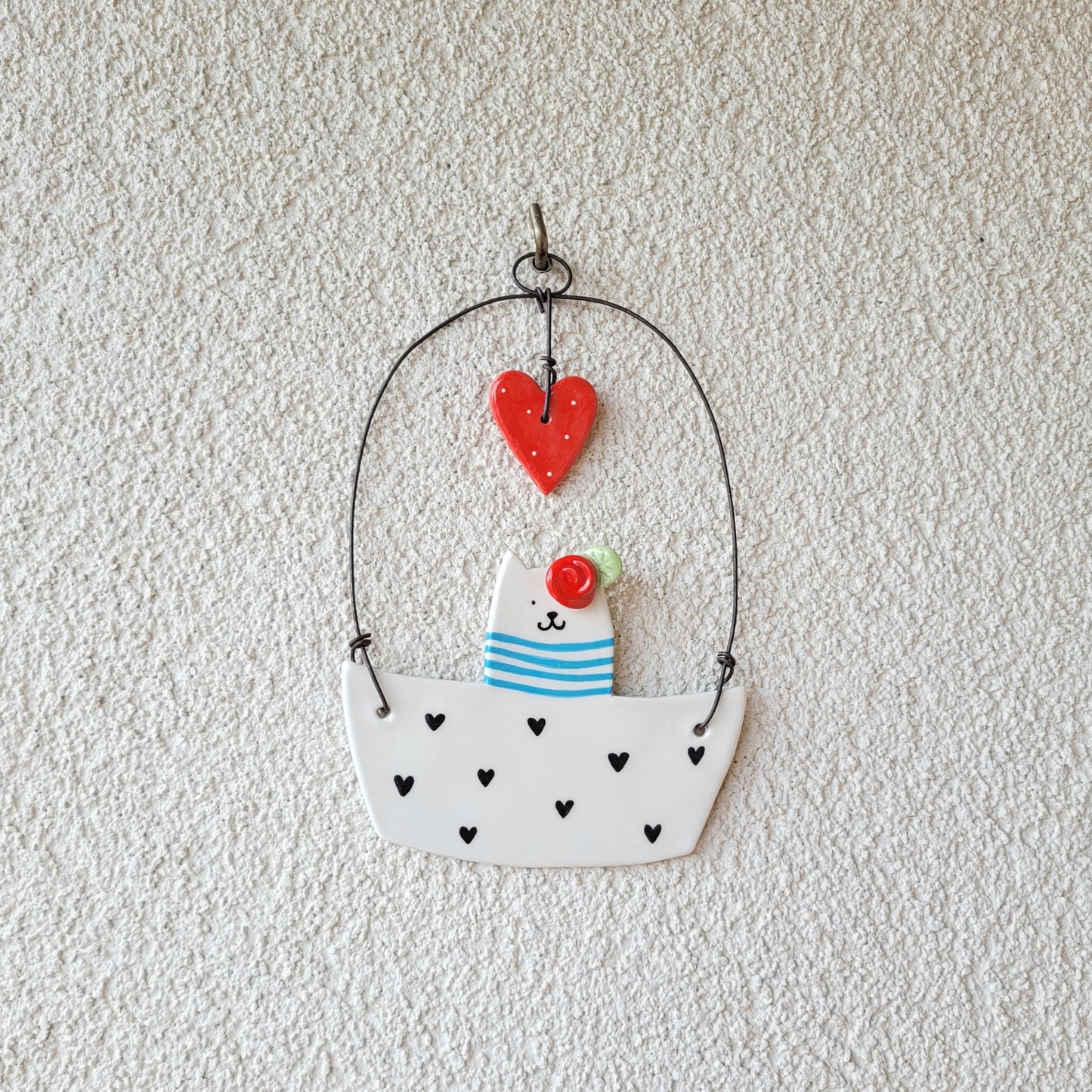 Ceramic wall hanging "Cat in a boat"