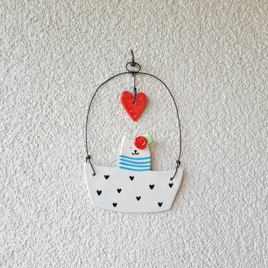 Ceramic wall hanging "Cat in a boat"