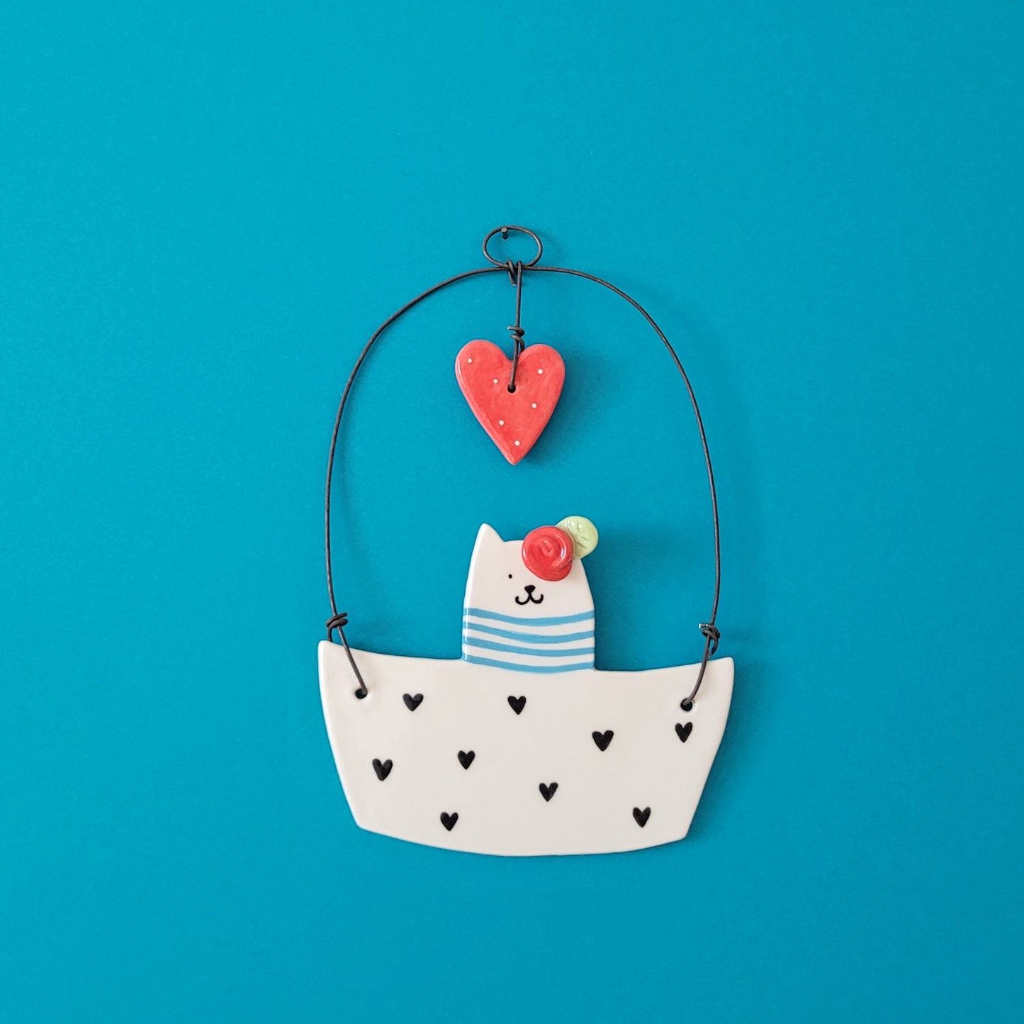Ceramic wall hanging "Cat in a boat"