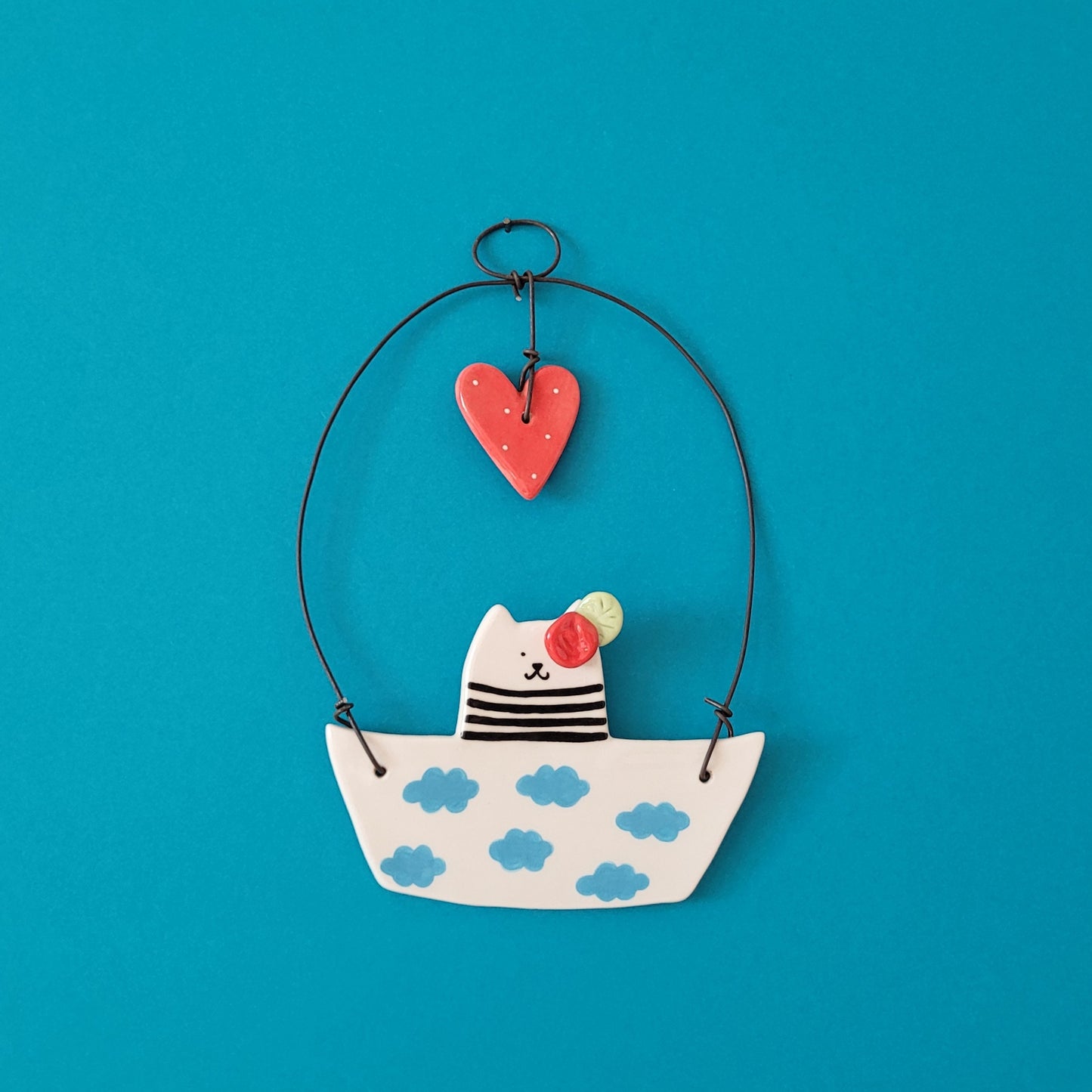 Ceramic wall hanging "Cute cat in a boat"