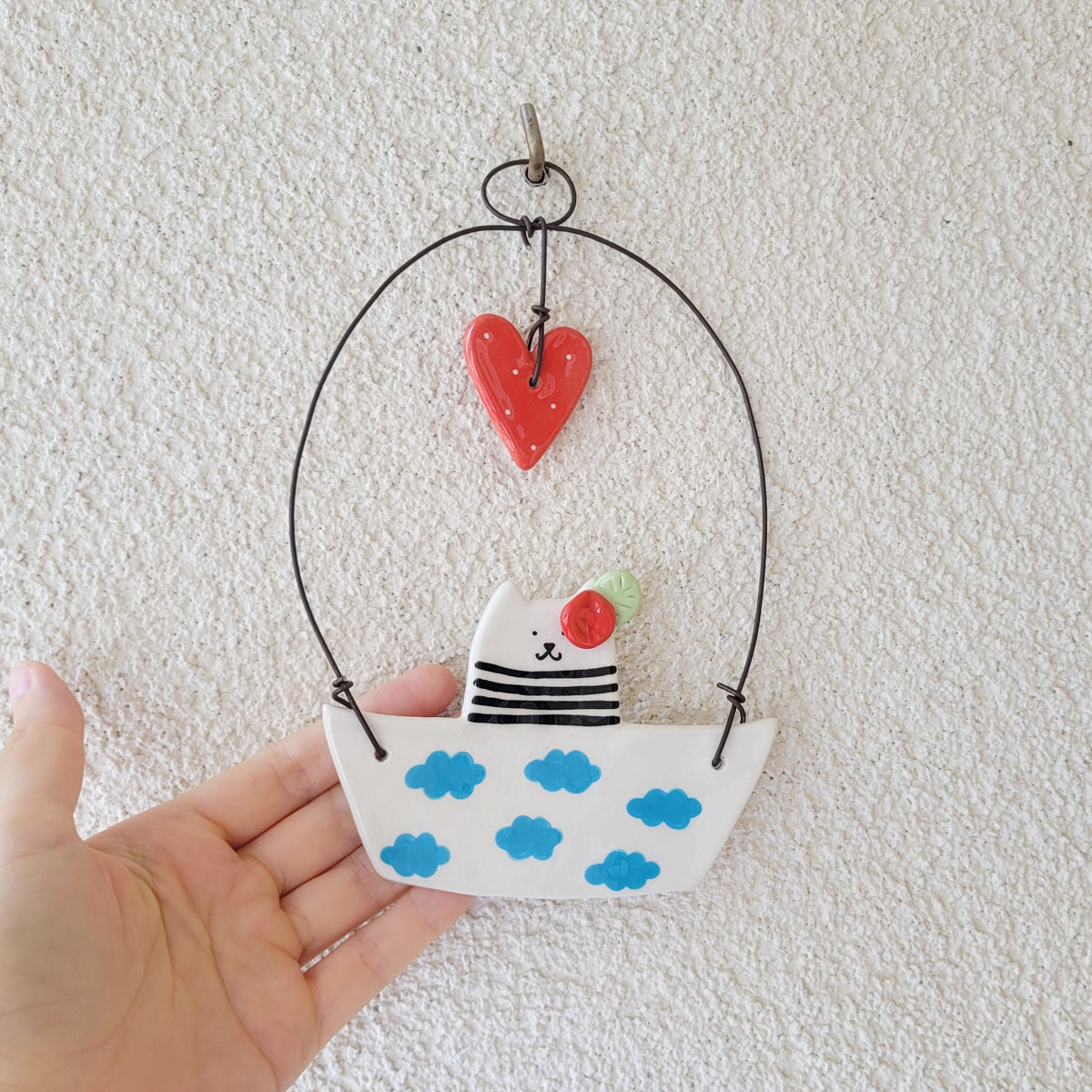 Ceramic wall hanging "Cute cat in a boat"