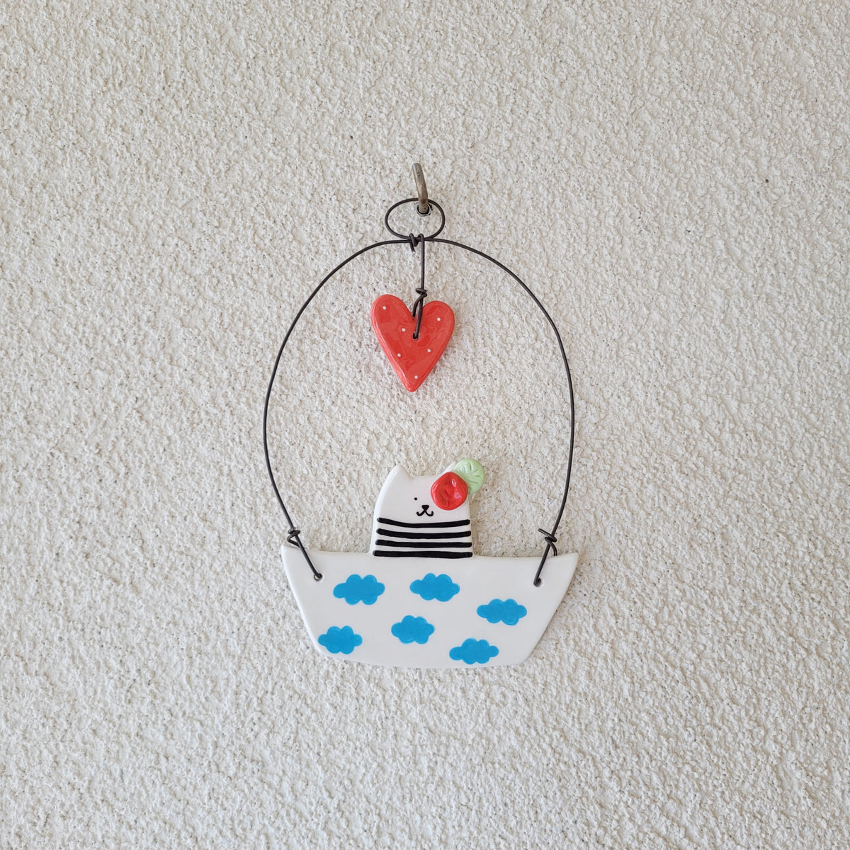 Ceramic wall hanging "Cute cat in a boat"