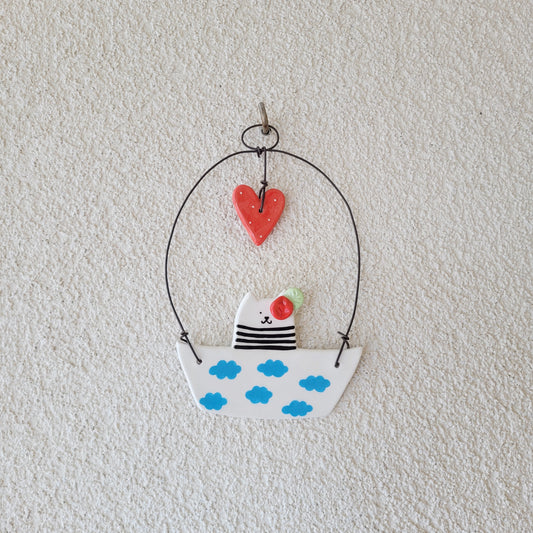 Ceramic wall hanging "Cute cat in a boat"