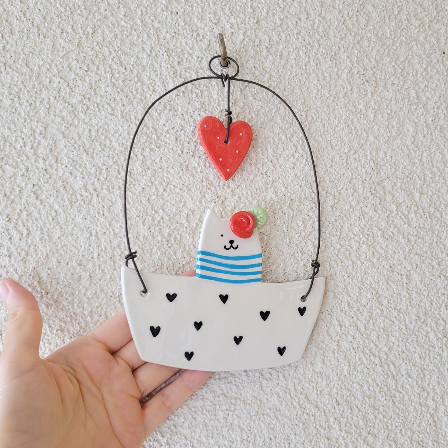 Ceramic wall hanging "Cat in a boat"