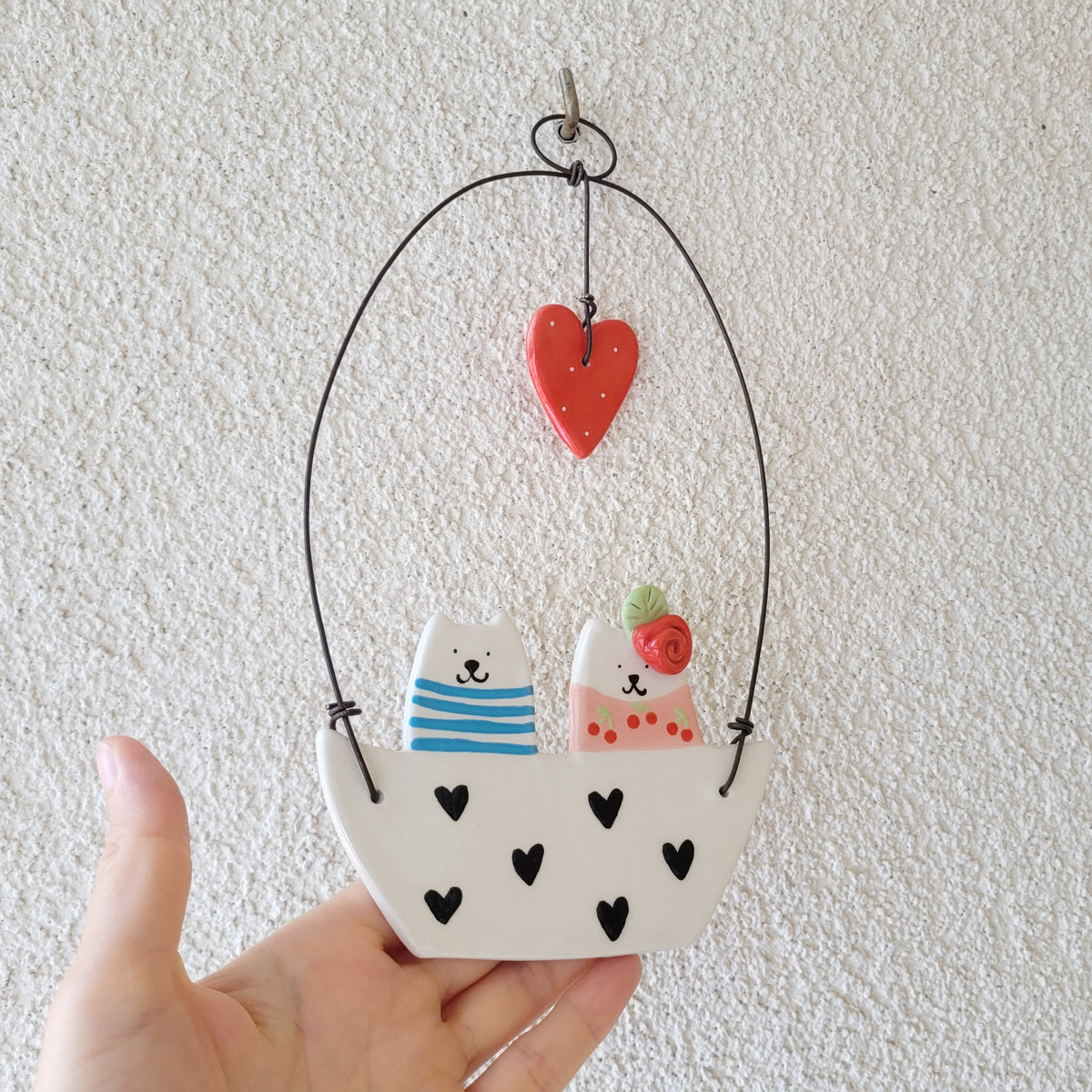 Ceramic wall hanging "Cats in a boat"