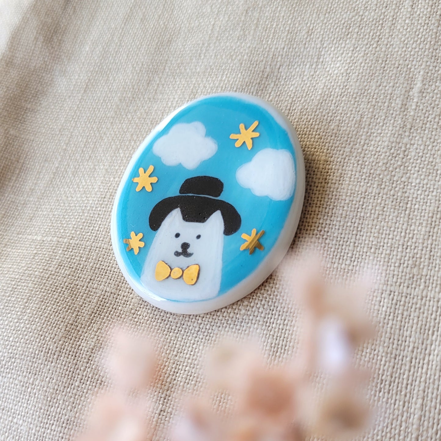 Porcelain brooch with gold "Cloudy day"
