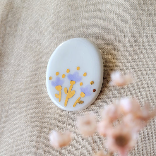 Porcelain brooch with gold "Purple flowers"