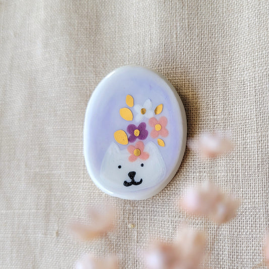 Porcelain brooch with gold "Cat with flowers"