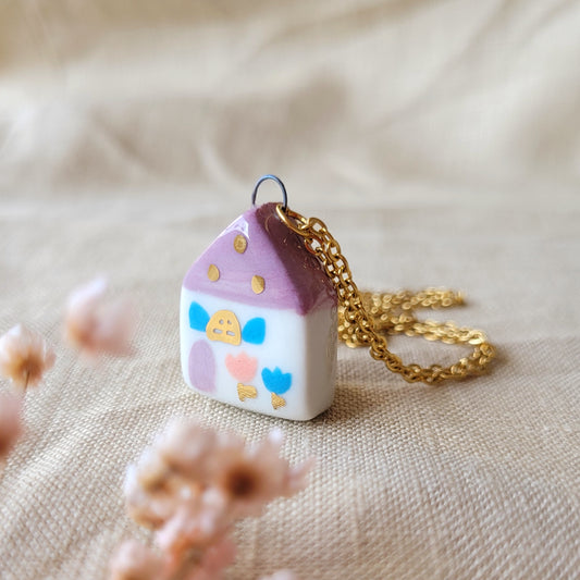 Porcelain necklace with gold "Dark pink house with blue window"
