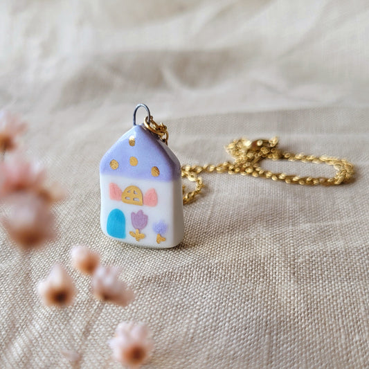 Porcelain necklace with gold "Light purple house with blue door"
