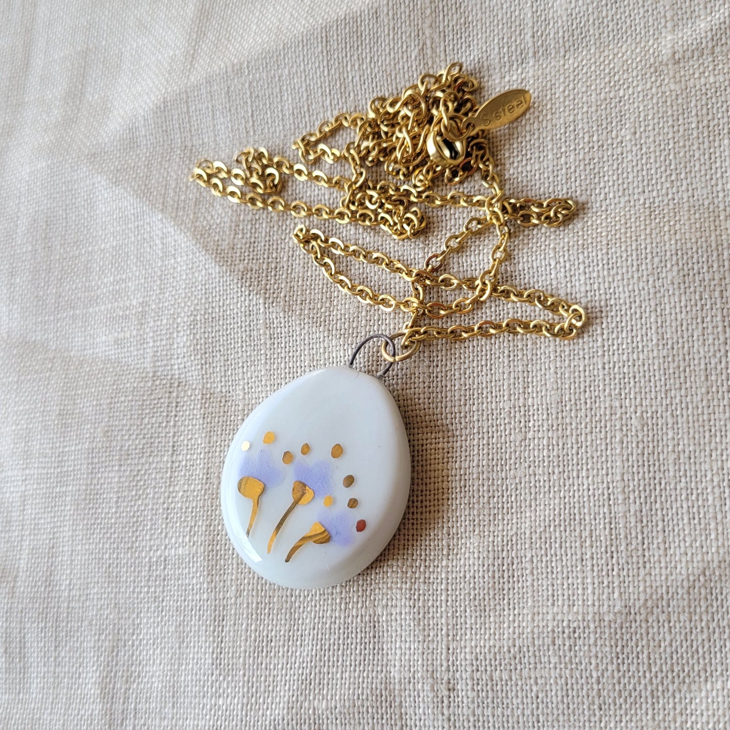 Porcelain necklace with gold "Light purple flowers"