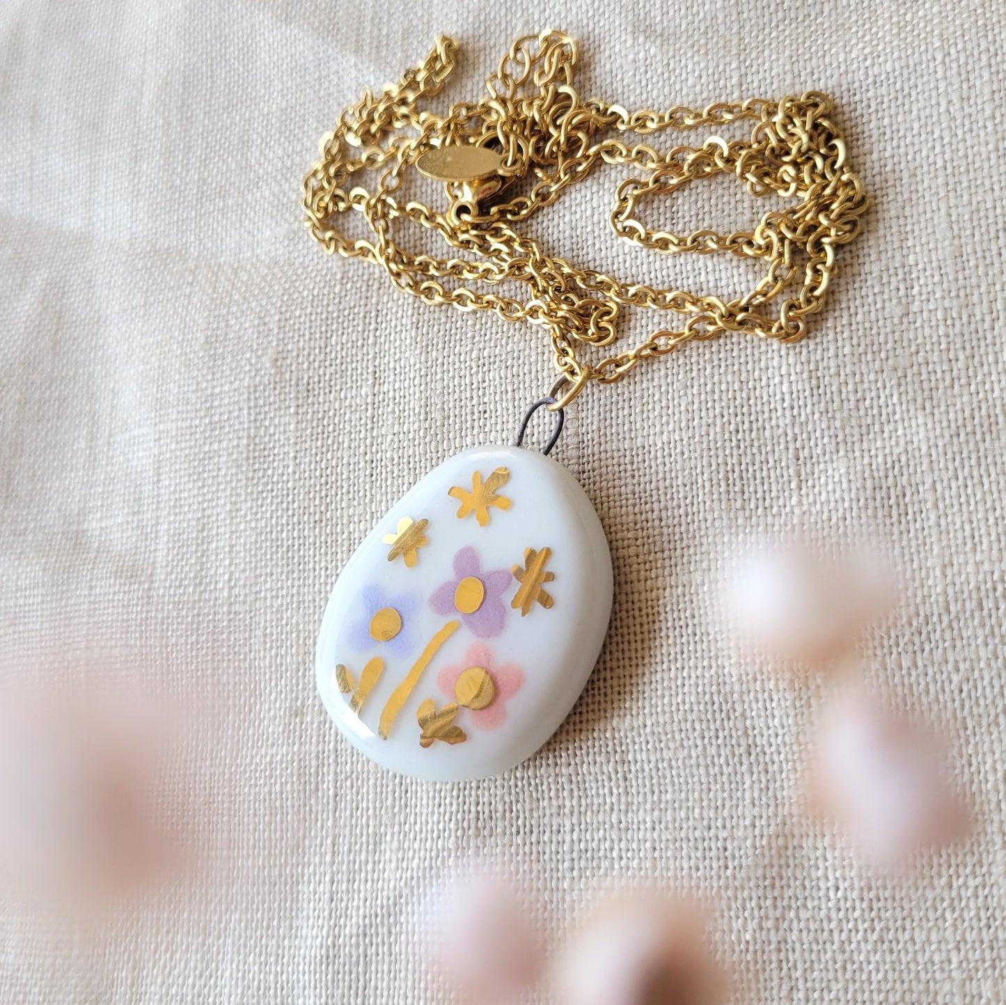 Porcelain necklace with gold "Flowers and stars"