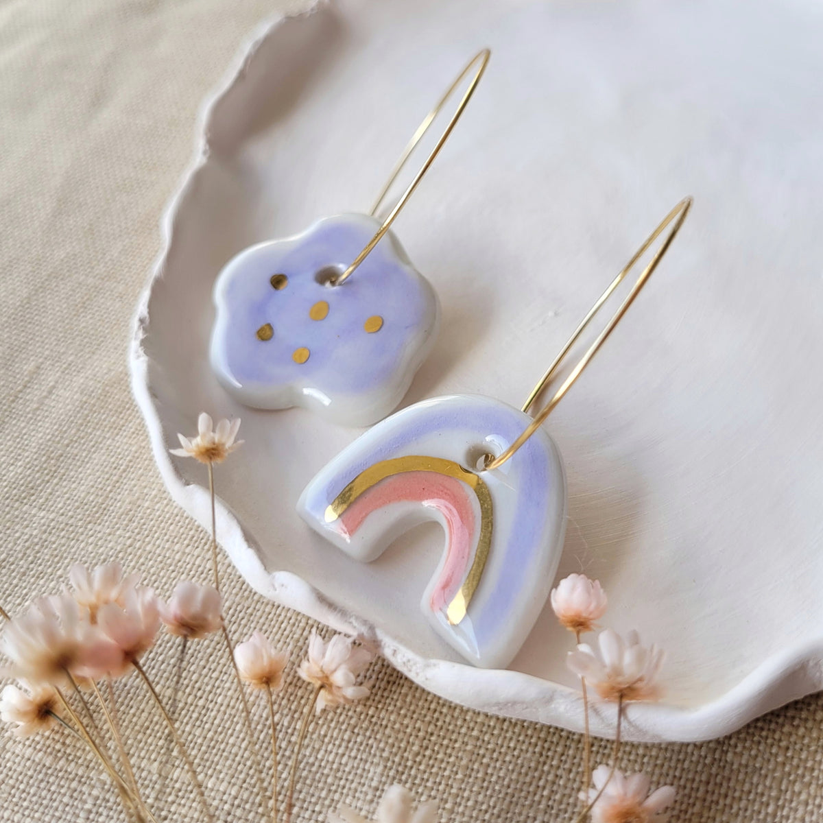 Porcelain dangle earrings with gold "Light purple cloud and rainbow with red"
