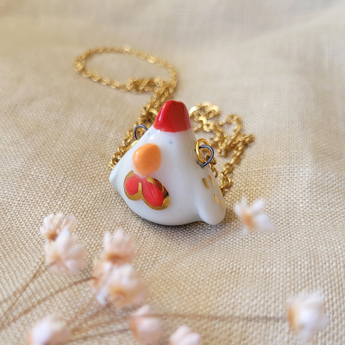 Porcelain necklace with gold "Chicken"