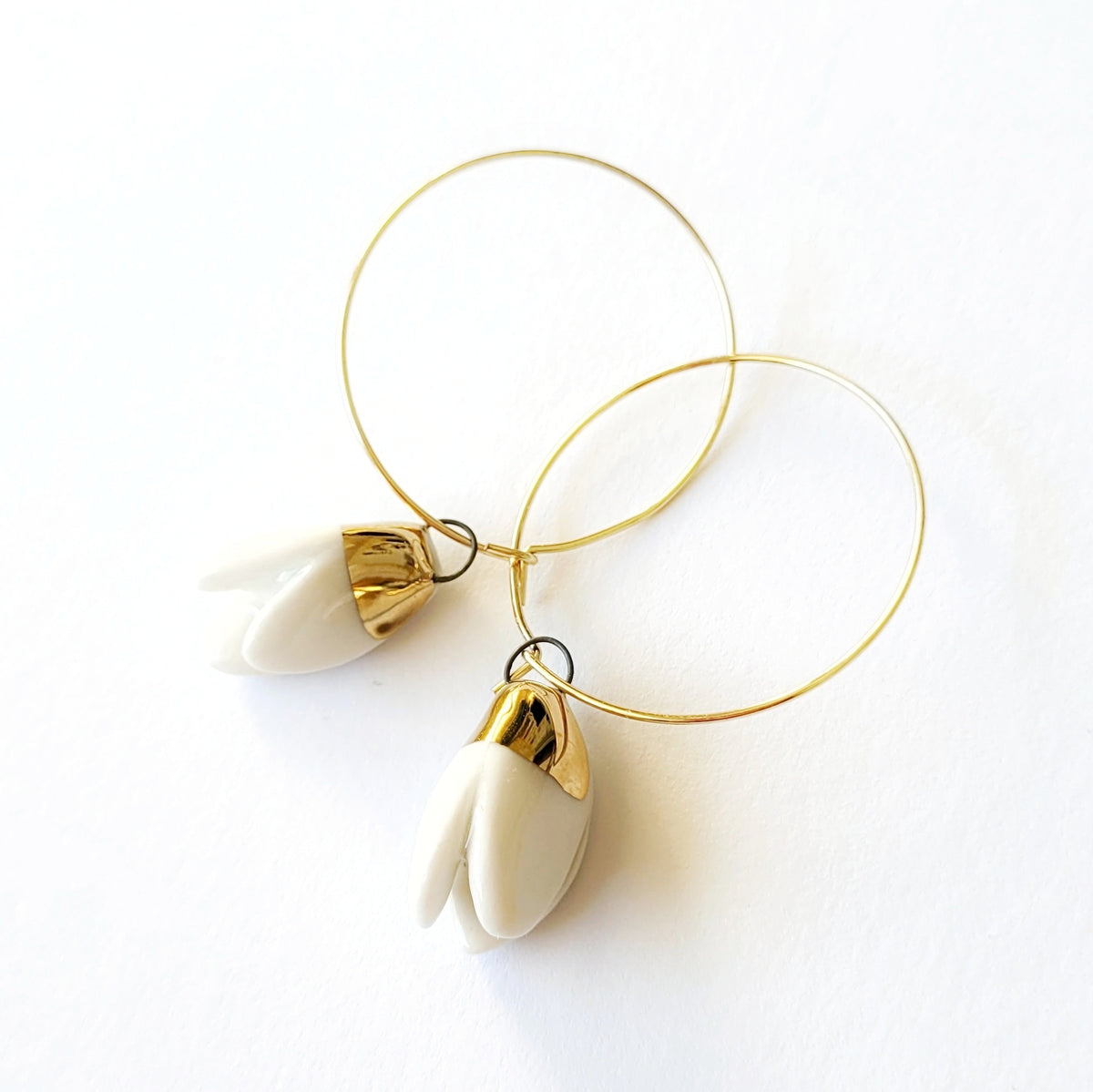 Porcelain dangle earrings with gold "Snowdrops"