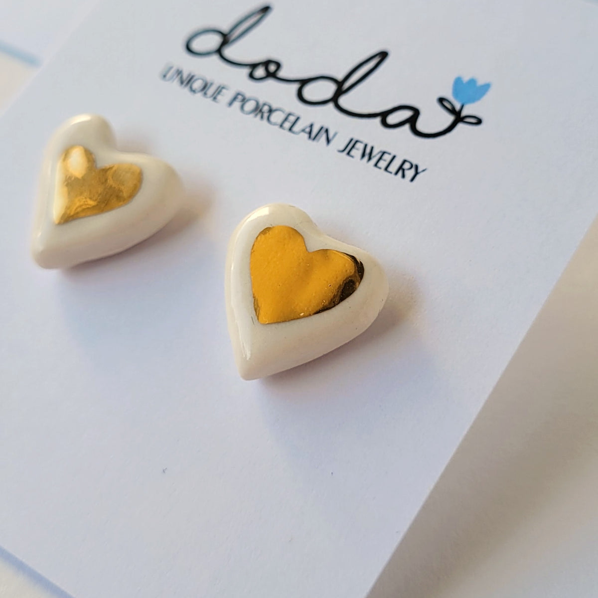 Porcelain stud earrings with gold "Tiny white hearts"