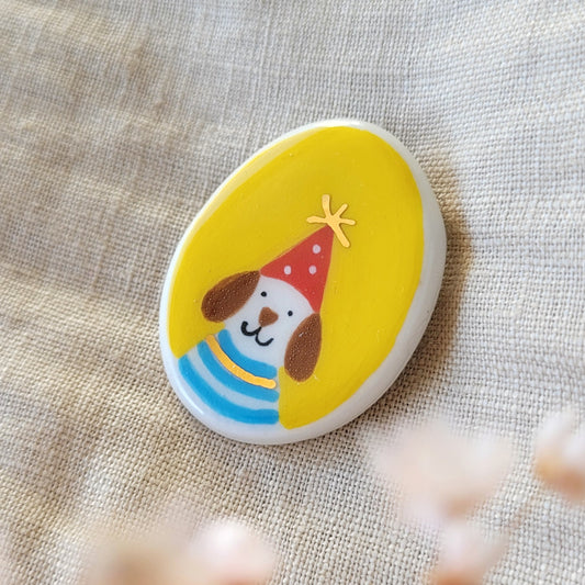 Porcelain brooch with gold "Pedro"