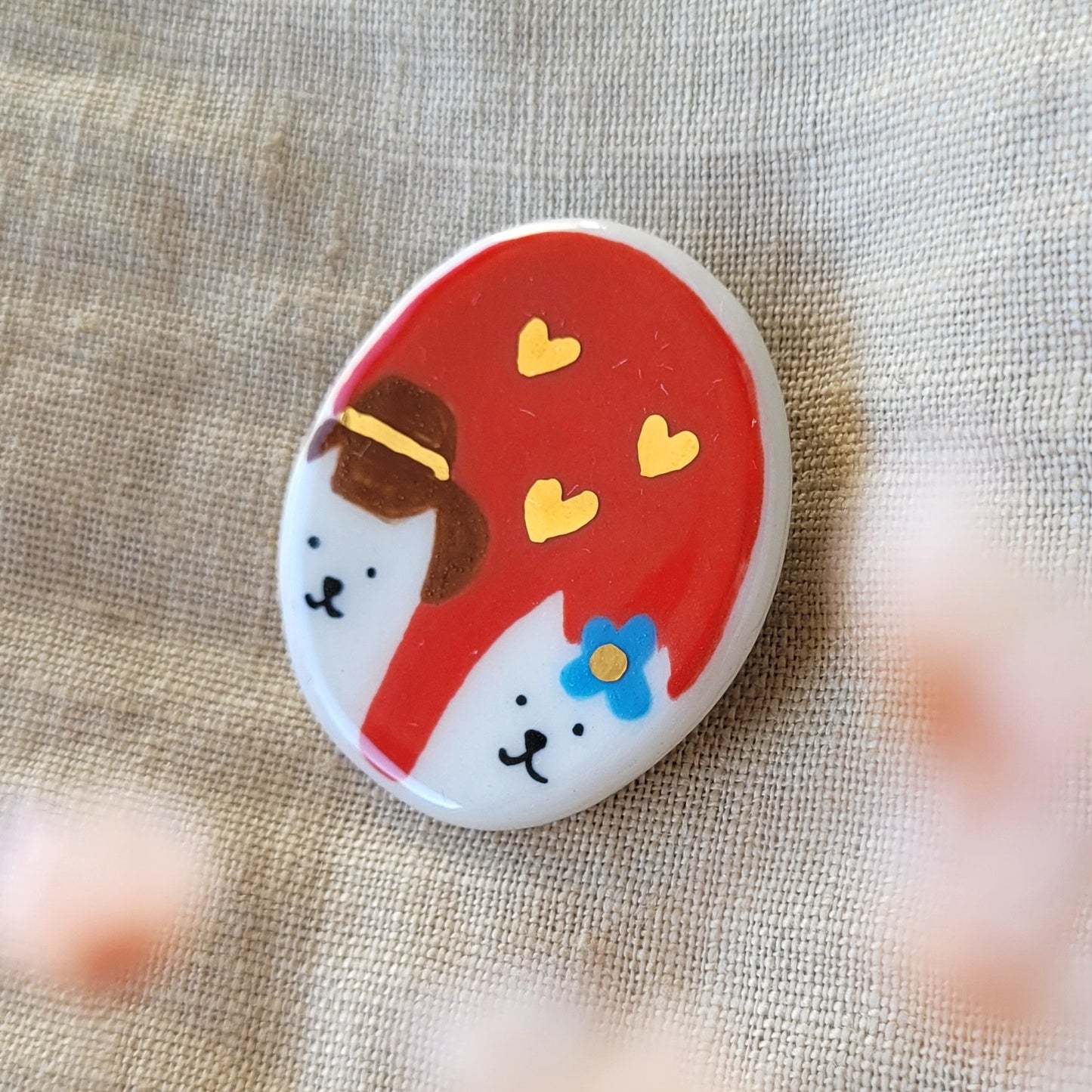 Porcelain brooch with gold "Love"