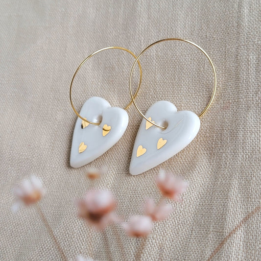 Porcelain dangle earrings with gold "White hearts"