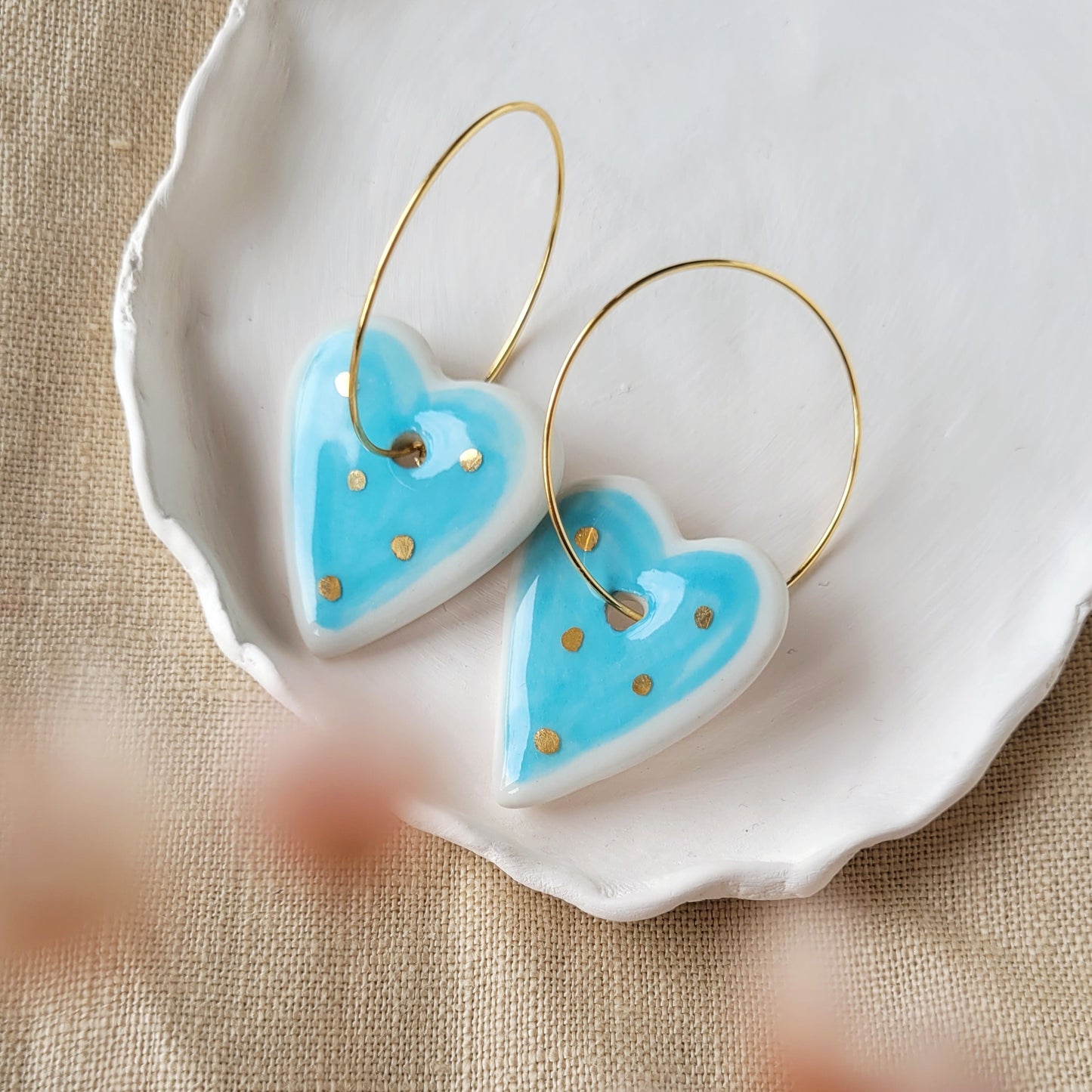 Porcelain dangle earrings with gold "White and blue hearts"