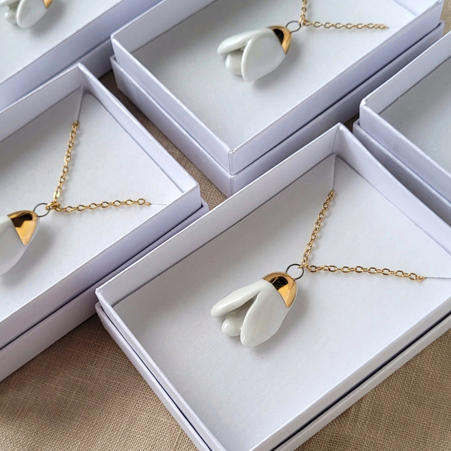 Porcelain necklace with gold "Snowdrop"
