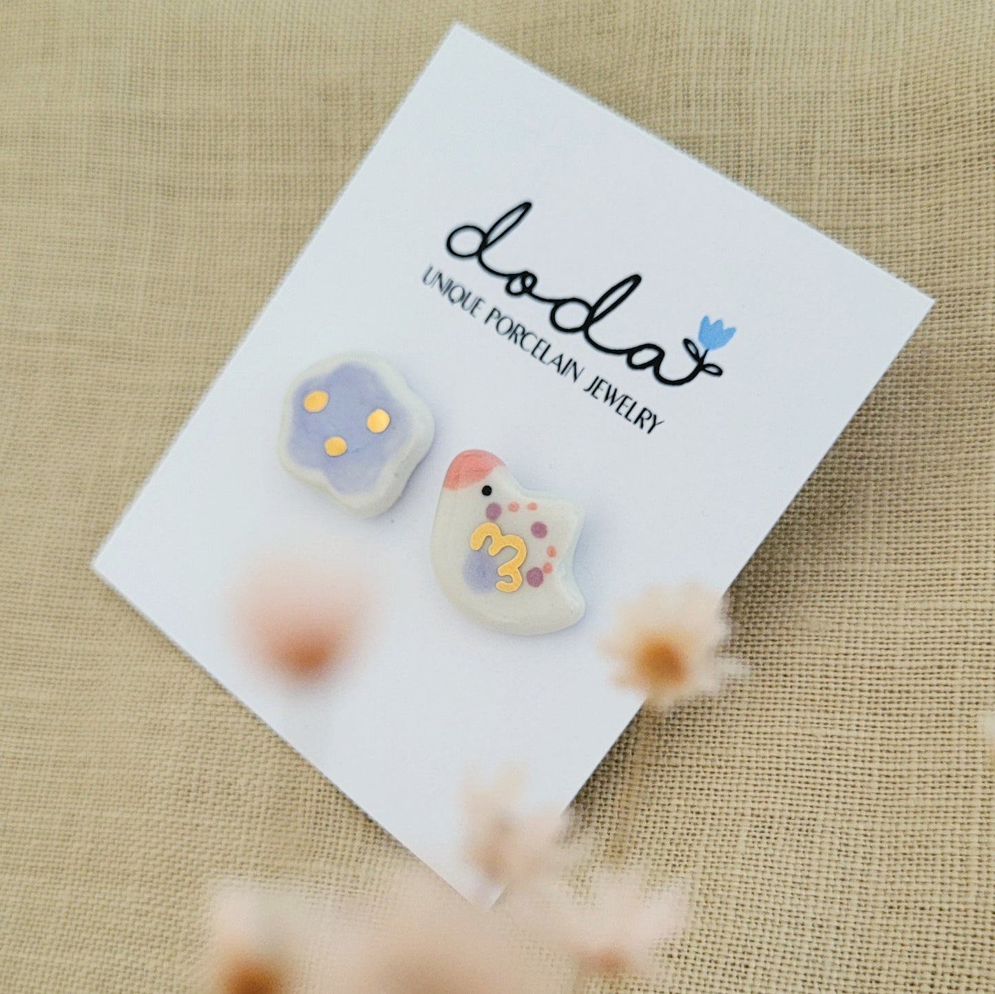 Porcelain stud earrings with gold "Little bird with purple cloud"