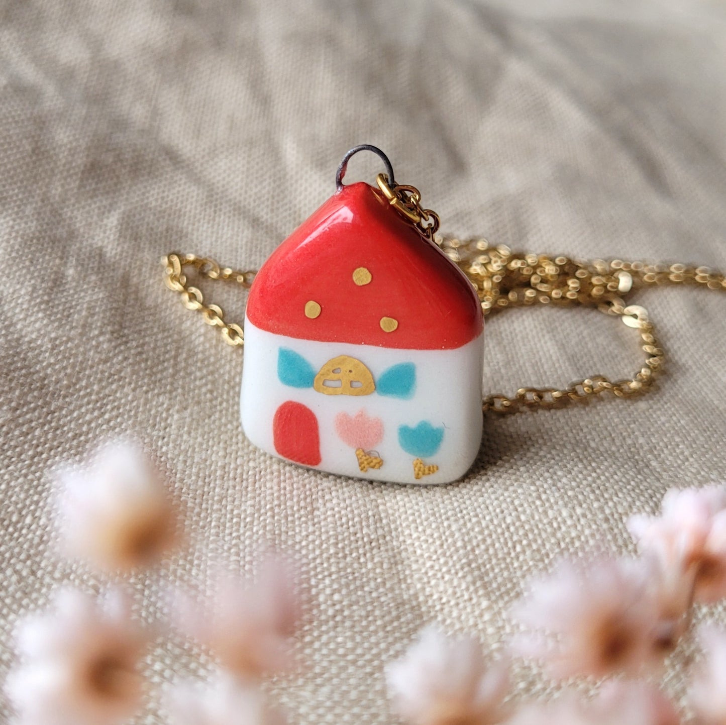 Porcelain necklace with gold "Red house with turquoise window"