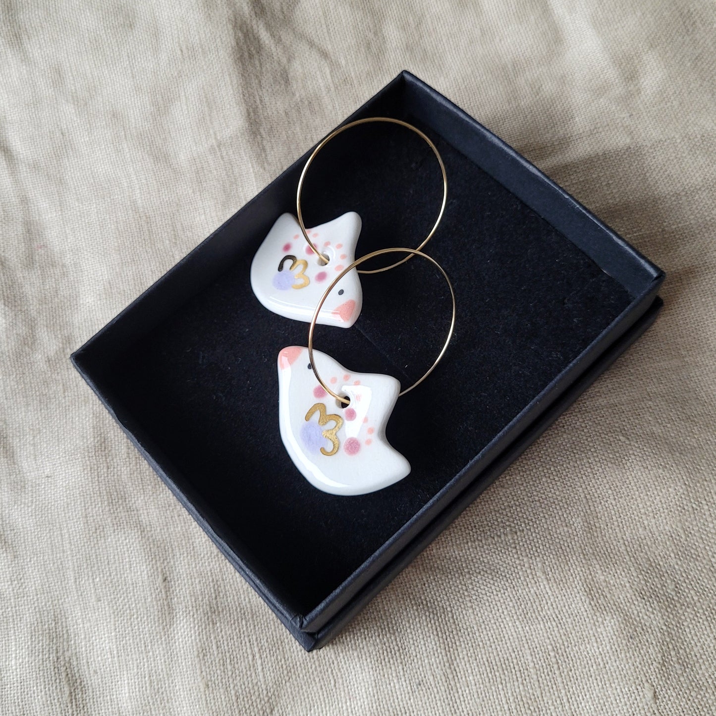 Porcelain dangle earrings with gold "White birds"