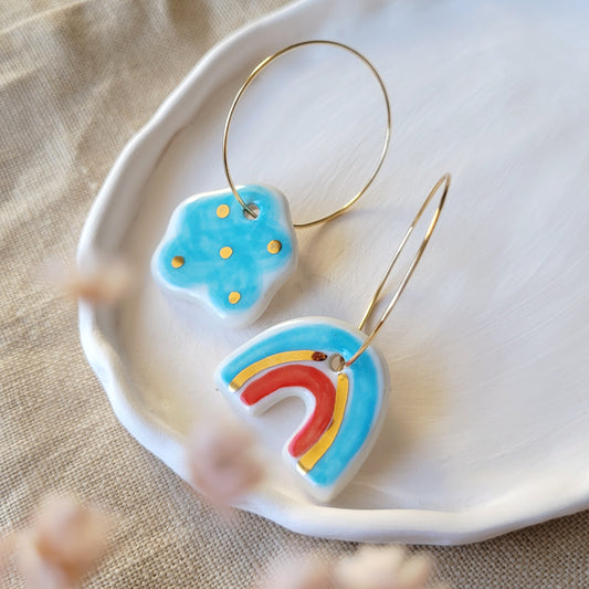 Porcelain dangle earrings with gold "Light blue cloud and rainbow with red"