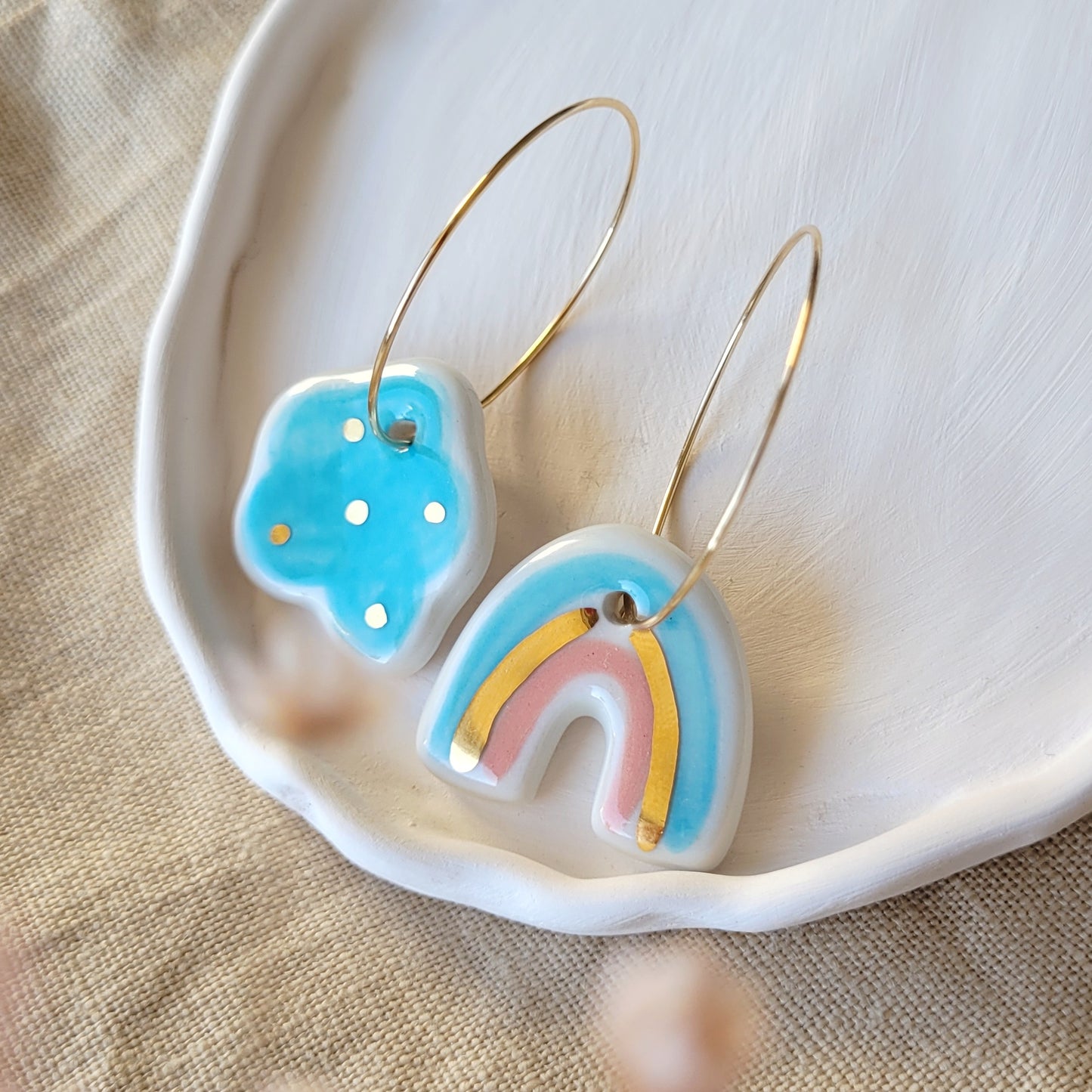 Porcelain dangle earrings with gold "Light blue cloud and rainbow with pink"