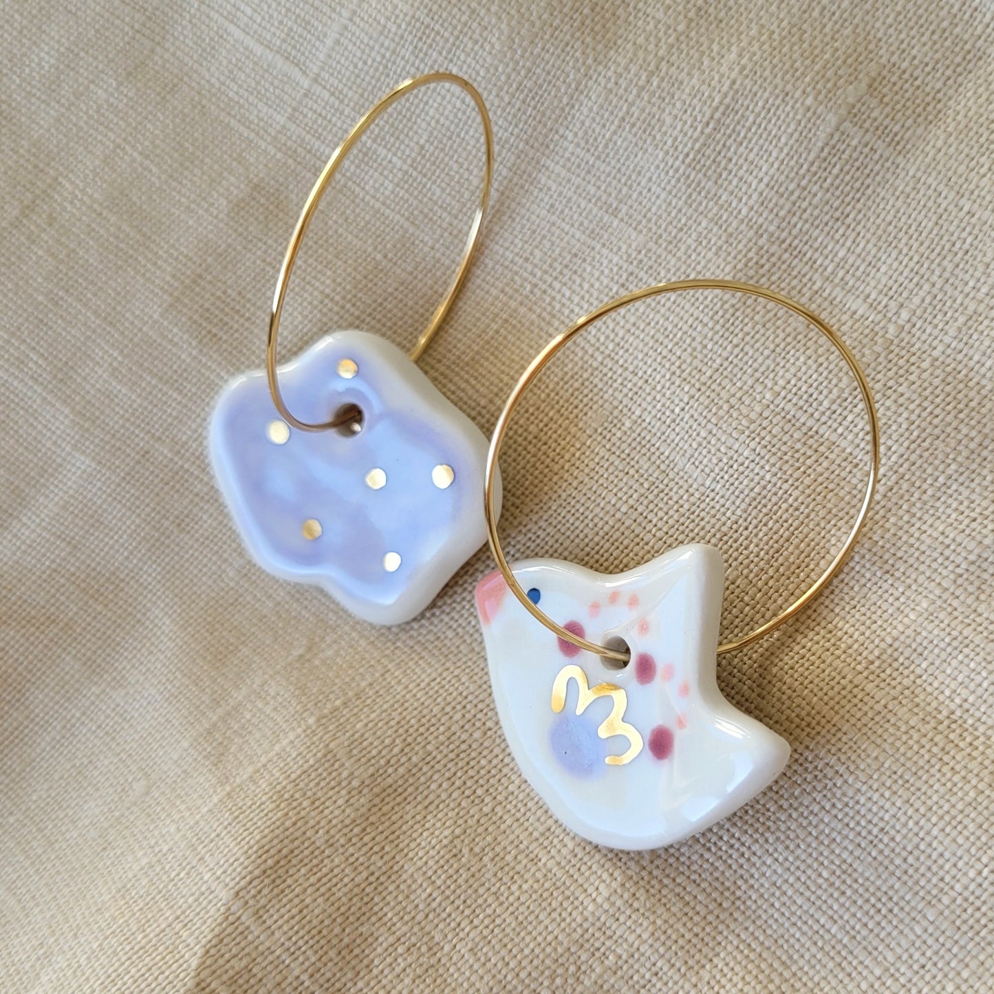 Porcelain dangle earrings with gold "White bird and light purple cloud"